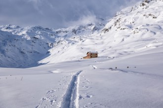 Snowy landscape in the alps of Valchiavenna in Montespluga village