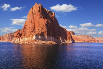 Lake Powell is surrounded by magnificent sandstone hills. Scenic huge artificial water basin of the