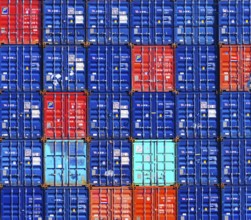 Piled up cargo containers in the Rotterdam harbor area