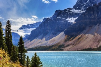 The Rockies of Canada. The picturesque huge and deep Lake Bow is surrounded by cliffs and glaciers.