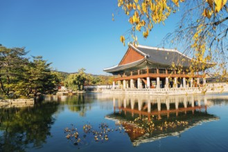 Gyeongbokgung Palace Gyeonghoeru with pond at autumn in Seoul, Korea