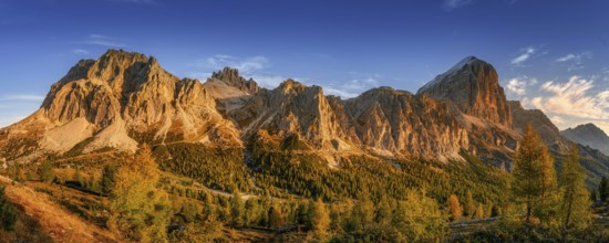 Lagazuoi mountain in the light of the setting sun near Passo Falzarego Autumn colors of the