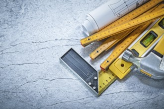 Set of construction tooling on abstract metallic background building concept