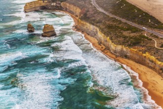 Australia. The Twelve Apostles is a group of limestone cliffs in the ocean near the coast in Port