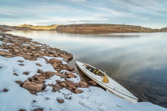 Decked expedition canoe on a shore of Horsetooth Reservoir near Fort Collins in northern Colorado,