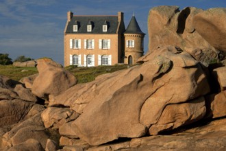Small castle between red rocks, Brittany, France, Europe