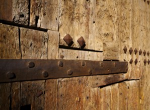 Ancient wooden door in Valencia Torres de Serranos at Spain