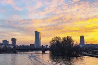 View across the Main to the ECB. Sunrise in the background of the buildings. Taken in the morning