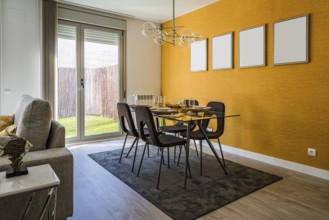 Stylish contemporary living room interior in white and yellow colors with sofa, table and posters