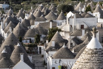 Scenic cityscape of downtown Alberobello with its famous Trulli buildings, Southern Italy