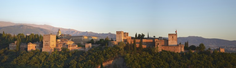View of the Alhambra complex in Granada, Spain, at dusk, Europe