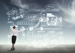Back view of businesswoman drawing business plan sketches