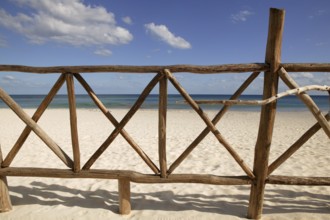 Caribbean wooden tropical fence wall on the beach