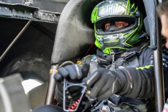 NHRA driver, Matt Hagan, prepares to qualify for the Dodge Power Brokers NHRA Mile-High Nationals