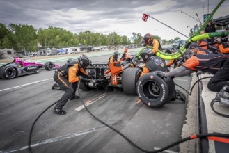 SANTINO FERRUCCI (14) of Woodbury, Connecticut comes down pit road for service during the XPEL