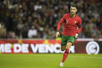 Football match, captain Cristiano RONALDO CR7 Portugal with broken running step to the left with