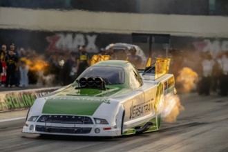 Sep 22, 2023-Concord, NC: NHRA Funny Car Series driver, Dave Richards, runs down the lane during a