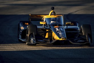 As the sun starts to set, NTT INDYCAR SERIES driver, SANTINO FERRUCCI (14) USA of Woodbury,