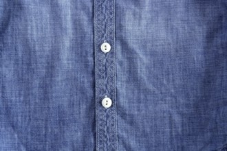 Denim blue jeans shirt with buttons detail texture