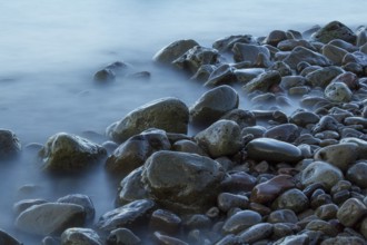 Time exposure of stones in the Westfjords coast, Iceland, Europe