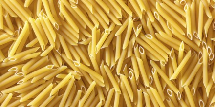 Top view of a background of scattered macaroni tubes. Food for cooking