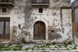 Abandoned alley and empty houses in Lesina, a small town in Gargano, Southern Italy