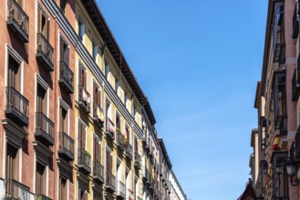 Old colorful and beautiful facades in old town of Madrid