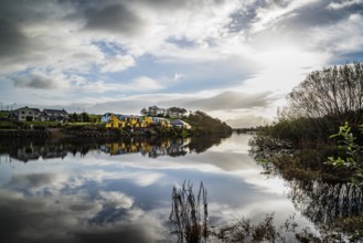 Beautiful reflections on river at morning in Killorglin in the wild atlantic way of Ireland