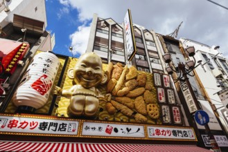 OSAKA, JAPAN - SEPTEMBER 24 2024: Osaka's famous Dotonbori area with many restaurants and iconic