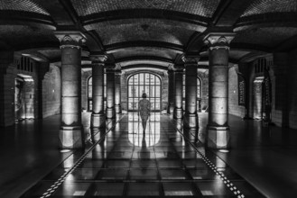 Woman in the Royal Depot warehouse of Thurn and Taxis, Brussels, belgium, August 2017
