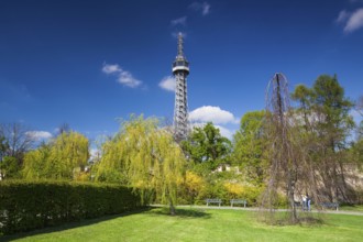 Lookout tower on the Petrin Hill in flowering spring park
