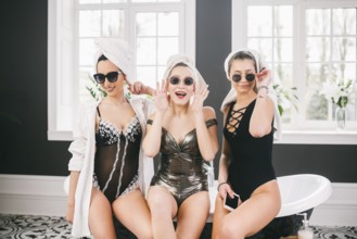 Theme female friendship. Party girlfriends, relaxation and spa procedures, hen party. Three