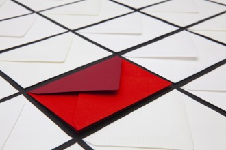 Composition with white and colored envelopes on the table. The photo suitable for various holidays
