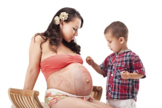 Pregnant woman and a little boy