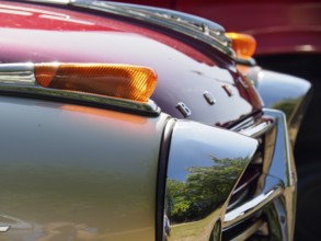 Detailed view of a vintage car with red paintwork and chrome accents, Bocholt, Münsterland,