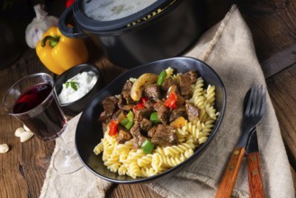 Fussili pasta with minced spiced goulash and paprika