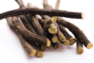 Licorice roots on white background