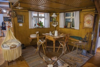 Farmhouse parlour with Herrgottswinkel and children's bed, local history museum, Wiggensbach,