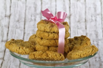 Delicious biscuits on a decorative background