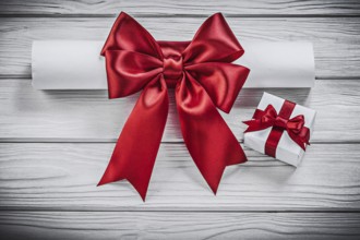 Paper roll with red bow present box holidays concept