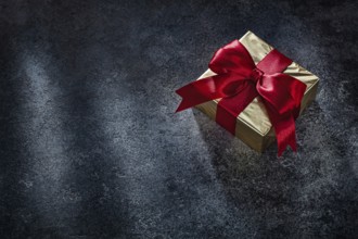 Square Golden Gift Box On Dark Background