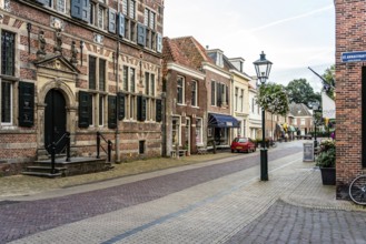 Naarden, Netherlands, August 5, 2016: Picturesque street in Naarden city centre. Naarden was