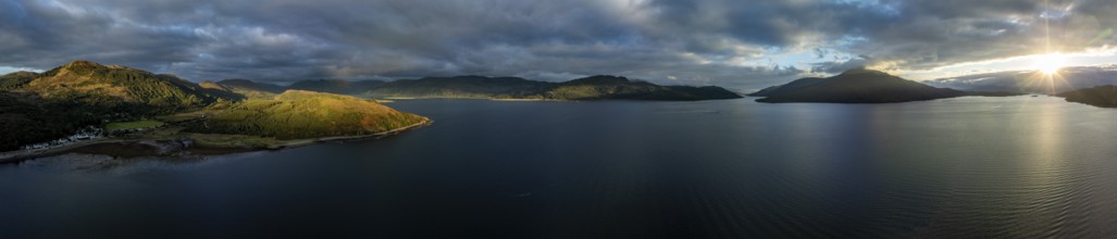 Evening mood at Loch Alsh with Tulach Ard hill and Skye Bridge, drone shot, Reraig, Kyle, Scotland,