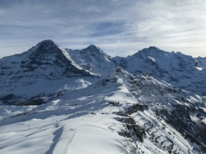 Eiger North Face and Monch Mountains in Winter. Swiss Alps. Switzerland. Aerial View