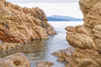 Rugged rocky coast of the Plage de Stagnoli on the Mediterranean Sea, Gulf of Sagone, west coast of