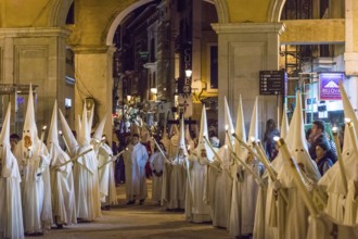 Hooded brothers, Holy Week in the Plaza Major, Holy Thursday procession, Palma, Mallorca, Balearic
