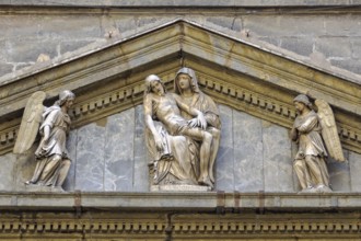 Sculpture of La Pieta by Michelangelo Naccherino in the tympanum above the entrance of the Chapel