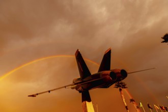 Dawn at Naval Air Field El Centro, CA: Sunlight paints vibrant hues across the sky, casting a