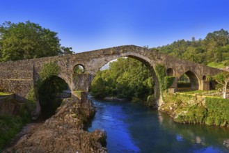 Cangas de Onis roman bridge on Sella river in Asturias of Spain