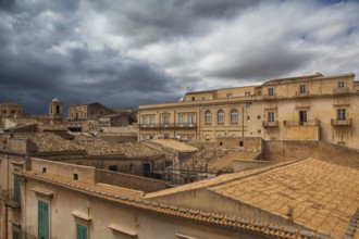 Above the rooftops before storm in Noto in Sicily